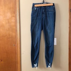 Good American Good Waist skinny jeans.